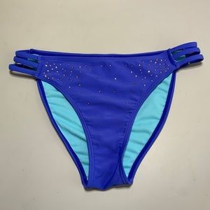 Xoxo bikini bottoms. Size small. Purplish blue with bronze color rhinestones.